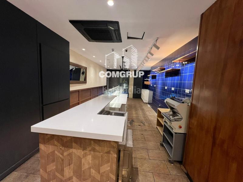 Foto 8a26cc8a-3070-46a3-94bf-5a7fa959d8e8. Local comercial venta despacho de pan en leixample en Barcelona