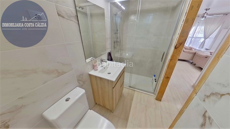 Foto 06b98547-cf6a-43d7-b9b9-5a859c3a0bfe. Casa aparellada amb xemeneia calefacció aparcament a Águilas