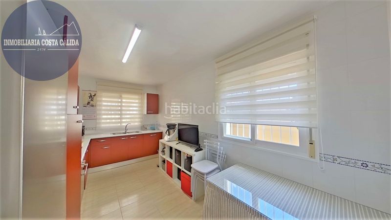 Foto 06e8b78d-73c2-42f3-8e13-e708587508af. Casa aparellada amb xemeneia calefacció aparcament a Águilas