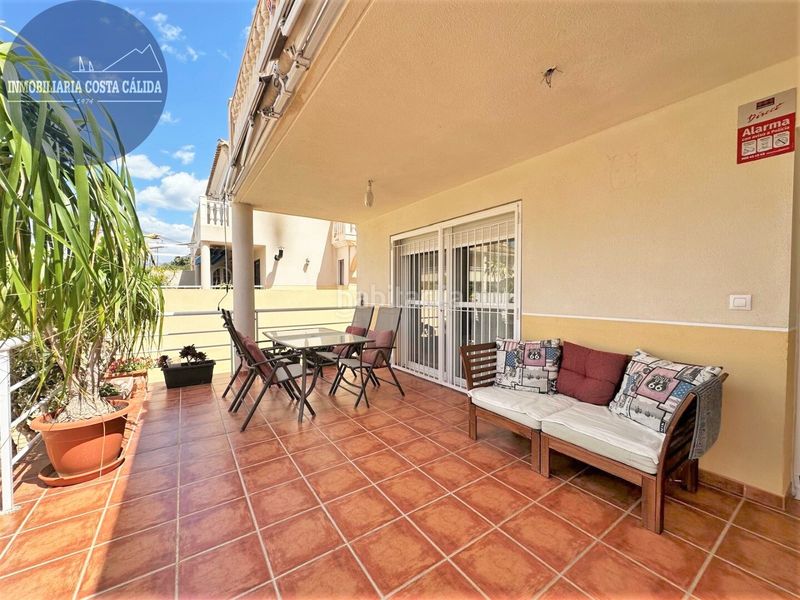 Foto 256aa060-bd9e-4b8a-af41-ac923dac66cb. Casa aparellada amb xemeneia calefacció aparcament a Águilas