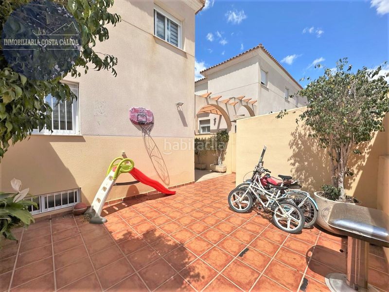 Foto 7128a7f9-4576-4a80-9b7b-ff4a00f3fa9c. Casa aparellada amb xemeneia calefacció aparcament a Águilas