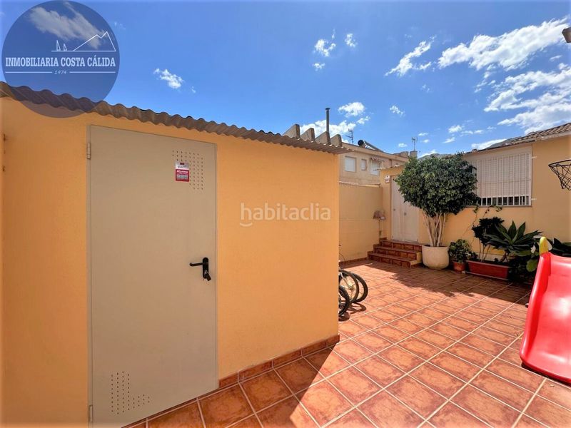 Foto c672a573-f978-41a1-a174-c866fe64d78f. Casa aparellada amb xemeneia calefacció aparcament a Águilas