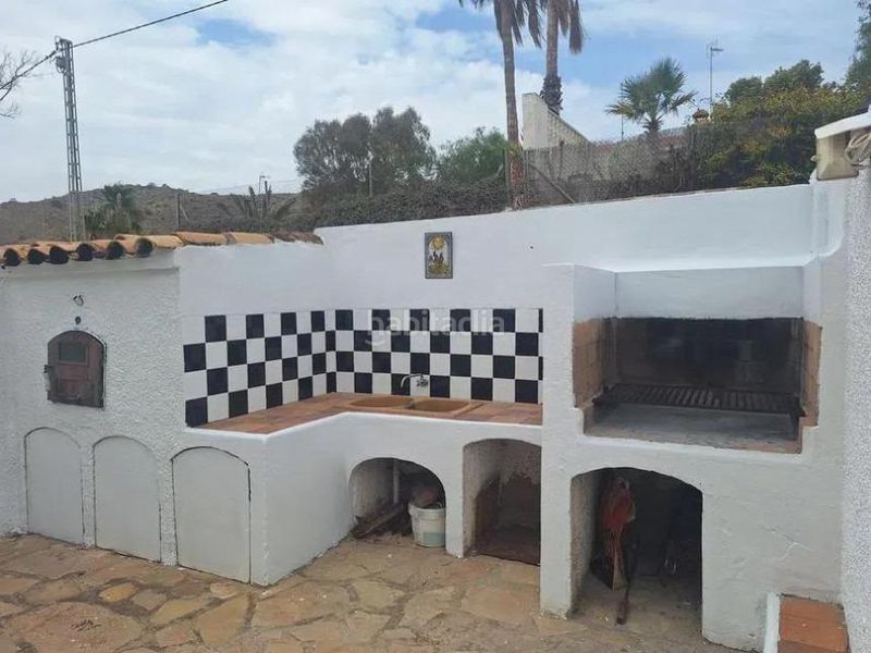 Foto d1316fbb-ad31-4530-a52e-bbce25ca61c6. Casa adossada a Pueblo Acantilado-Lanuza Campello (el)