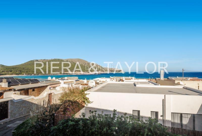 Foto fb8928cb-e54a-4a3f-b3d1-d764503b3f60. Casa pareada local con apartamento y almacen en cala agulla en Capdepera
