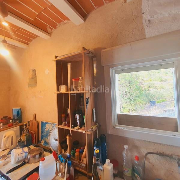 Foto c12f852f-c678-4c7b-bce8-24d7de741c9c. Finca rústica finca en venta en Benifallet