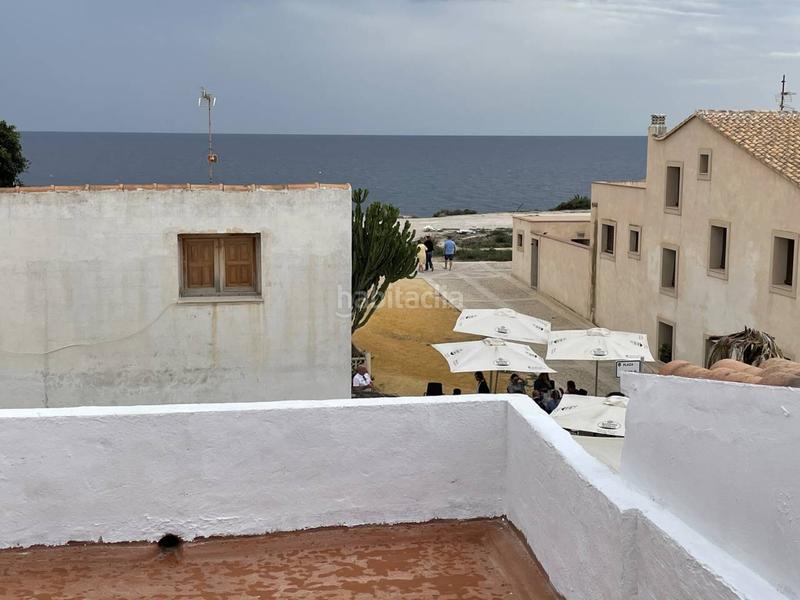 Foto c8a1b5b9-a4e2-4ea6-861d-e50be56c7499. Semi detached house in Tabarca Alicante