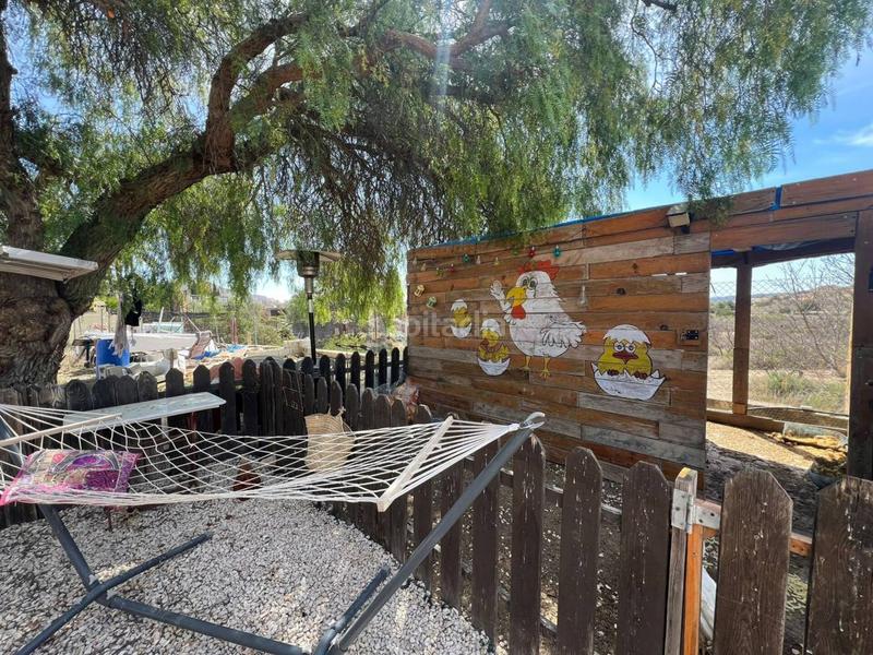 Foto fd52574f-c00a-4e72-85ee-cebcd593cbf1. Chalet con parcheggio piscina in Cañada del Fenollar Alicante