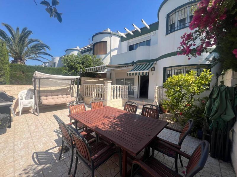 Foto ca321d64-1b0e-4cd5-b03b-2c0c64799b8f. Casa a schiera con parcheggio piscina in Cabo de las Huertas Alicante