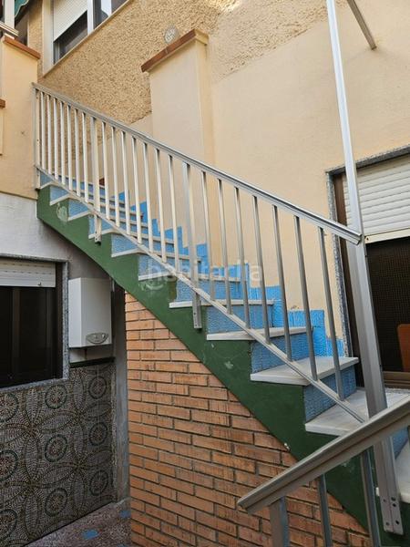 Foto fc4ba969-e060-4638-9f5e-cb8de5fc674f. Casa a schiera con parcheggio in Los Ángeles Alicante