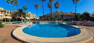 Apartament en Les Bassetes - El Marjal. Planta baja con terraza, jardn privado y piscina comunitaria a