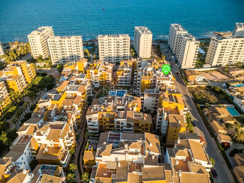 Foto 51844599-0a73-4dae-b448-3f710e8059de. Pis a calle ciclón 8 a Punta Prima Orihuela