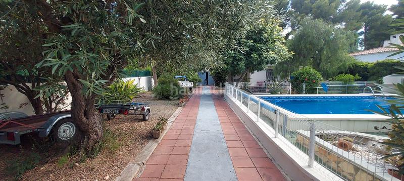 Foto f995a783-9266-4be8-bcf9-24329d376ebf. Maison avec cheminée parking piscine dans Platja de Mont-roig Mont-roig del Camp