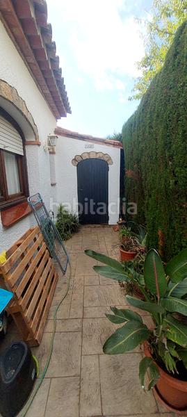 Foto 1afb4543-ed4d-4a2d-bf47-046c007c78ae. Casa aparellada amb xemeneia piscina a El Casalot Mont-roig del Camp