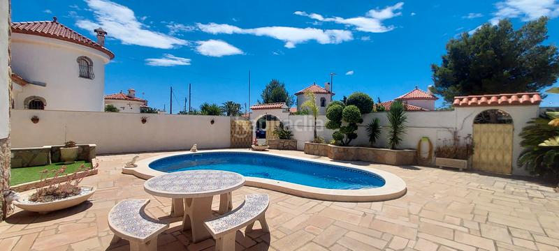 Foto beb0539f-8a1e-4744-ac2f-04a674e6317b. Chalet with fireplace heating parking pool in Centre Miami Platja