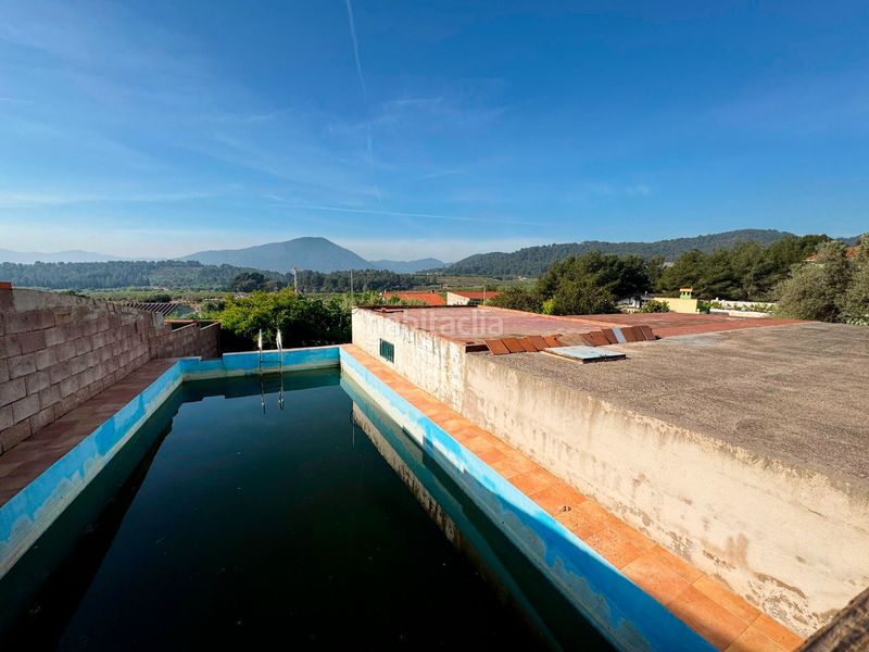 Foto 112e8065-39d3-49f4-93c7-85049607d5db. Masia amb piscina a Onda