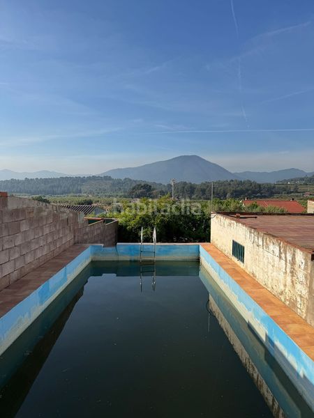 Foto 7e587e78-c82c-4dca-a78e-50b26260e7fb. Masia amb piscina a Onda