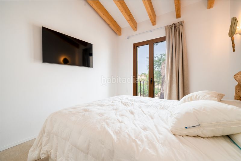 Foto 4b9f1c47-be8b-439f-a998-ffddf3549c5a. Casa adossada amb calefacció aparcament a Pòrtol Marratxí