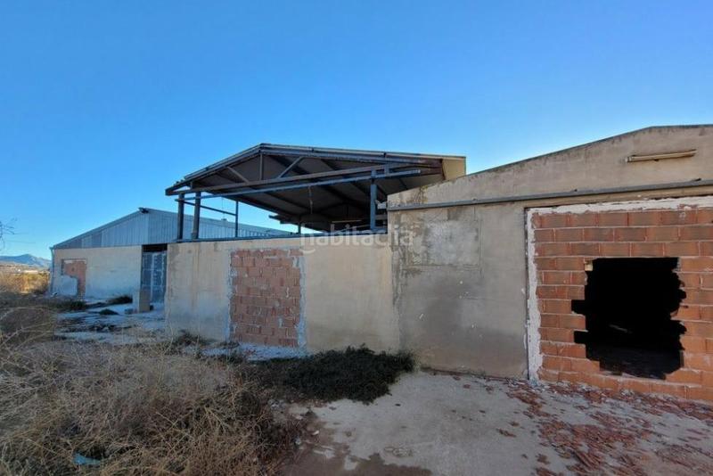 Foto 072a6a64-1786-438f-9f9f-f0c5f1d92e1e. Bâtiment à usage industriel dans Romana (la)