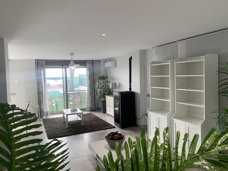 Foto 4ce450b4-1340-4f96-81bb-6f5b370a84e3. Chalet espectacular chalet en primera linea de Playa en Burriana