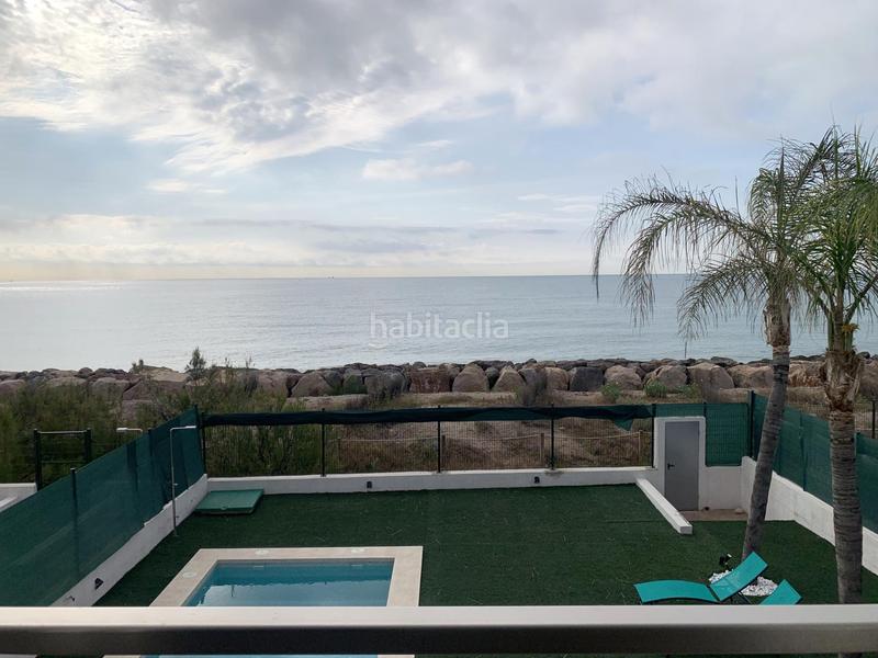 Foto a84fc7bc-2c9a-4259-9678-f671d07f671d. Chalet espectacular chalet en primera linea de Playa en Burriana