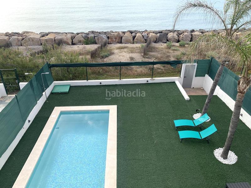 Foto d4c2f2dd-07bb-4c89-ad1a-768a76d48368. Chalet espectacular chalet en primera linea de Playa en Burriana