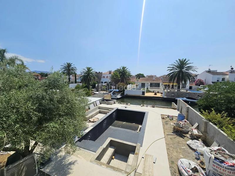 Foto 149b4eb1-a120-457e-9c43-60330abbe1a8. Casa  en venta con amarre en Cap Ras - Creus - Falconera Empuriabrava