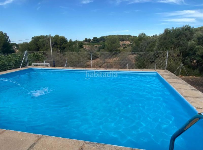 Foto d2769b27-5184-4e34-9676-69a482df38ff. Casa amb piscina a Casco Urbano Náquera