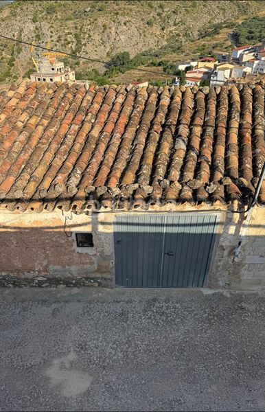 Foto 3ae4da55-4f48-4ee3-808d-51dd93d7f7ed. Casa adossada a Enguídanos