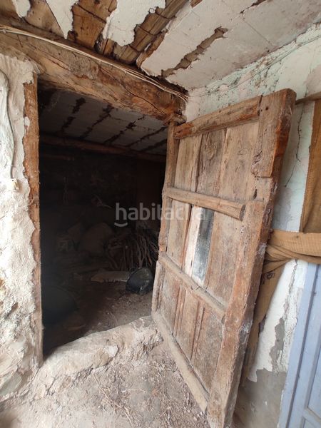 Foto 5052e5eb-f27c-4b3f-974e-cb2df3a41336. Casa adossada a Enguídanos
