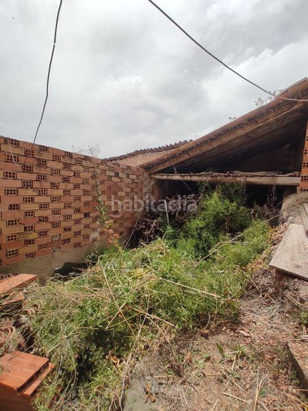 Foto 7df2ecf3-62d7-4b4a-9756-0852f2436e75. Casa adossada a Enguídanos