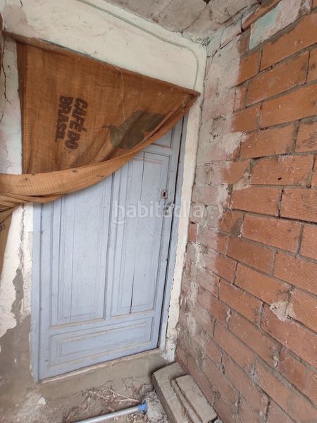 Foto a800bedc-b229-4190-9104-9cb978286687. Casa adossada a Enguídanos