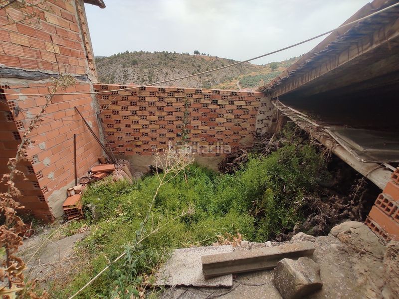 Foto e79efaf4-6dde-4e52-823f-7d01ce226bde. Casa adossada a Enguídanos