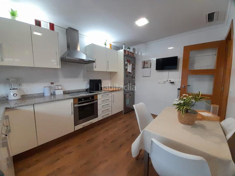 Foto 2cc3a6d7-5b11-46fc-bfce-d876a8f78aba. Casa adossada amb calefacció aparcament a Nuevo Centro Sagunt