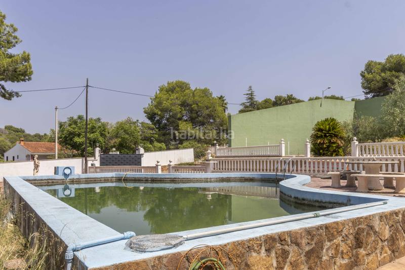 Foto a72527cc-e905-4260-985d-d10c0bab1e73. Casa chalet con piscina, pista de frontón y dos viviendas independientes o en Sagunt