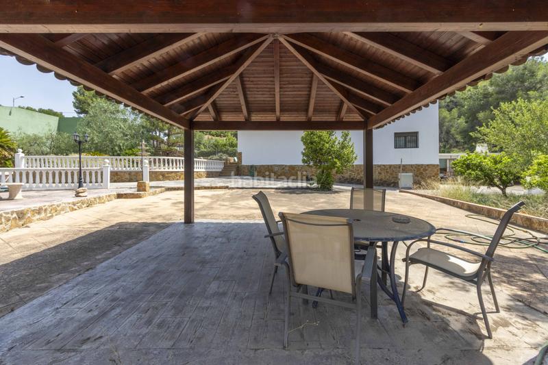 Foto fb9e57d9-fb79-4563-b79b-c69dd5bdccf9. Casa chalet con piscina, pista de frontón y dos viviendas independientes o en Sagunt