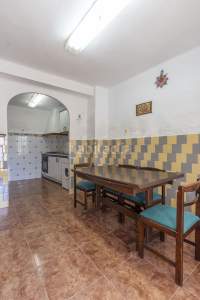 Foto f234a746-8287-4187-8d11-cb6375679c45. Casa adossada a Serra