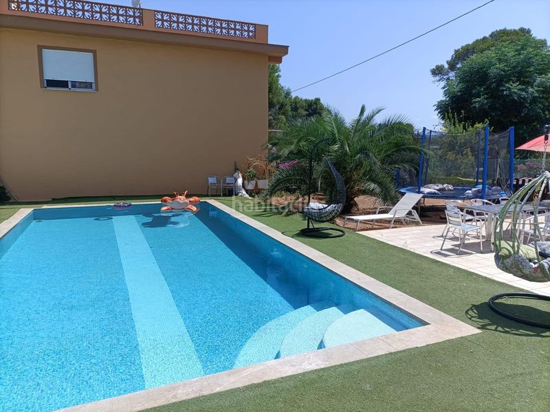 Foto 4f49bc84-0f8a-4d2f-9391-f2ca59984f44. Chalet exclusivo chalet con amplios espacios y comodidades en Palma de Gandía