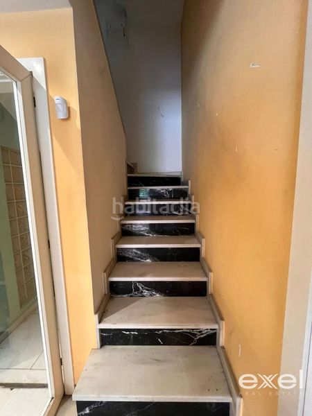 Foto 2b31f324-ae5f-4418-a15f-59a4a093538d. Casa amb aparcament a Centre Prat de Llobregat (El)