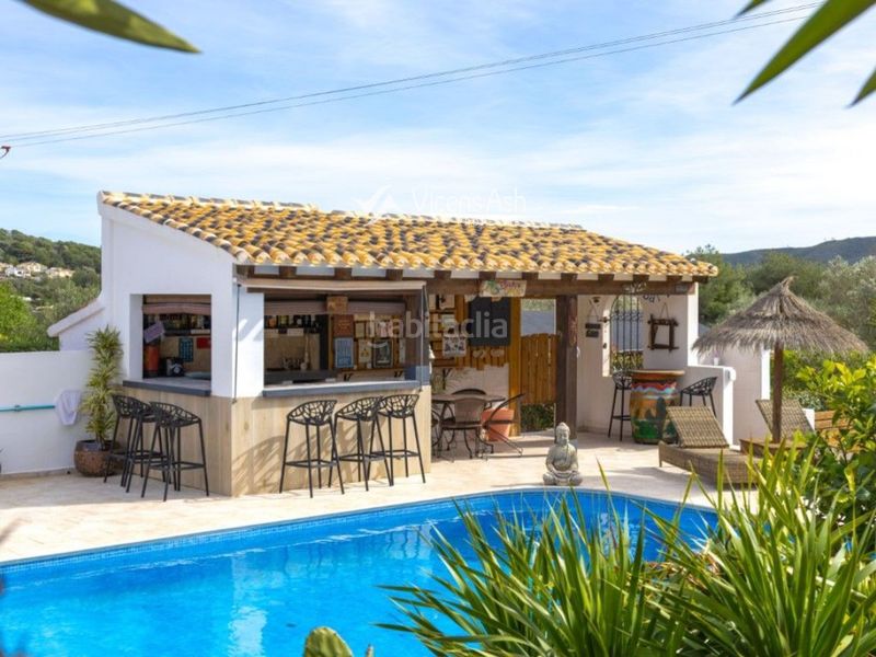 Foto a22cadf6-c1cb-48d5-a8a7-31deb7f71a90. Casa amb aparcament piscina a Partida Comunes-Adsubia Xàbia