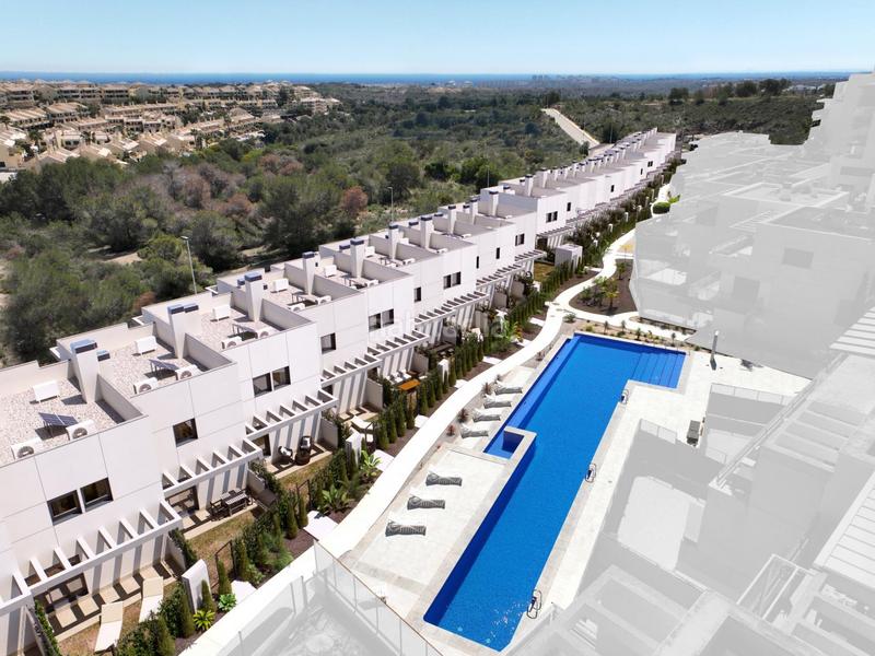 Foto a2524497-8f8d-4e0c-85a0-711a2b221639. Casa a schiera con riscaldamento parcheggio piscina in Orihuela