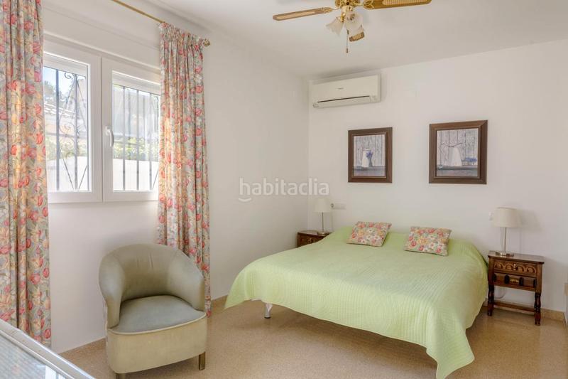 Foto 568fa7ed-a293-48fb-8fd2-b0a59cb87299. Chalet fantástico chalet independiente con piscina privada y garaje – 2 dormitorios en Nucia (la)