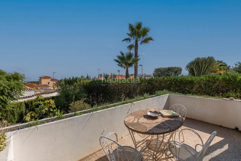 Foto 9d8d131f-bb5a-47f8-b51e-9765eec4f5e3. Chalet fantástico chalet independiente con piscina privada y garaje – 2 dormitorios en Nucia (la)