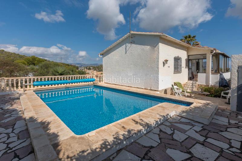 Foto bc0c6511-6687-45ef-8fcd-ad0e884318f7. Chalet fantástico chalet independiente con piscina privada y garaje – 2 dormitorios en Nucia (la)