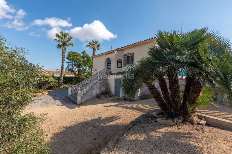 Foto f5eb1e36-b05a-428d-b8a4-bacf1cb7006a. Chalet fantástico chalet independiente con piscina privada y garaje – 2 dormitorios en Nucia (la)