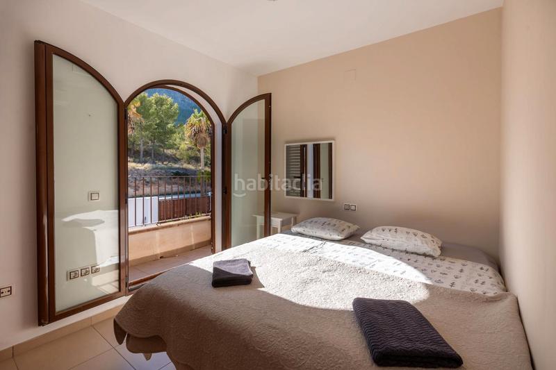 Foto 96b47888-5ddc-477c-87e2-b3e96a773ad9. Casa a schiera con parcheggio piscina in Polop