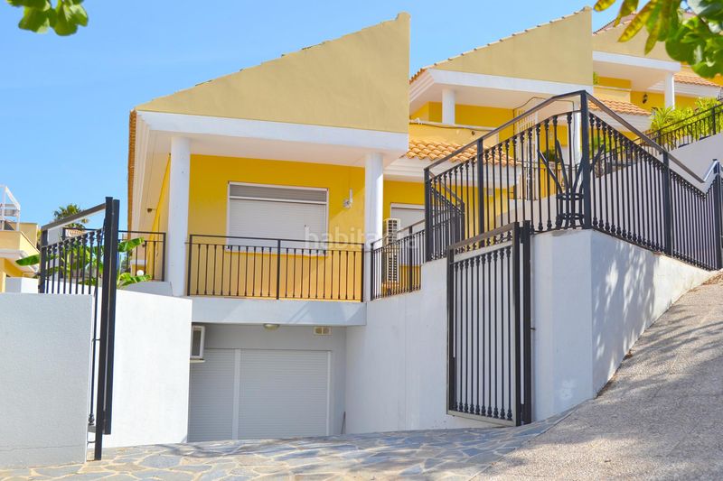 Foto 356e5ca8-9a0e-45c3-ab65-4699371358e1. Casa adosada acogedora casa adosada de dos plantas con preciosas terrazas y bonitas vistas en una atractiva zona residencial. en Alfàs del Pi (l´)