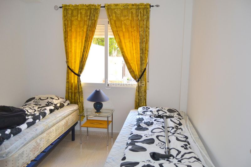 Foto 42bdc4f6-9c1d-408c-a2ec-4ecd98214696. Casa adosada acogedora casa adosada de dos plantas con preciosas terrazas y bonitas vistas en una atractiva zona residencial. en Alfàs del Pi (l´)