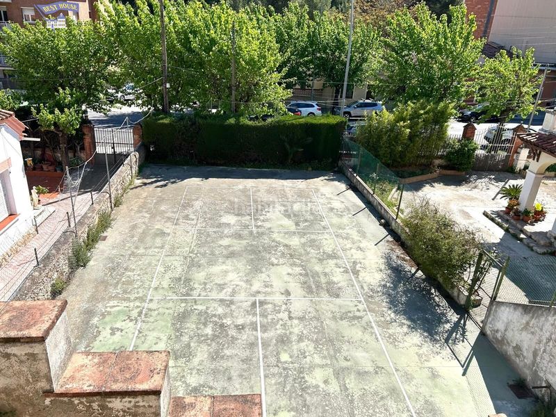 Foto ed8d2e35-fd1d-4d63-ba99-ea13cd618f07. Casa amb calefacció aparcament piscina a Vallirana