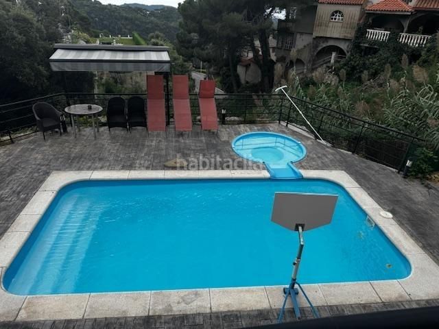 Foto 17433daa-9509-4a8f-ba44-bd883f493f16. Casa amb calefacció aparcament piscina a Sant Cebrià de Vallalta