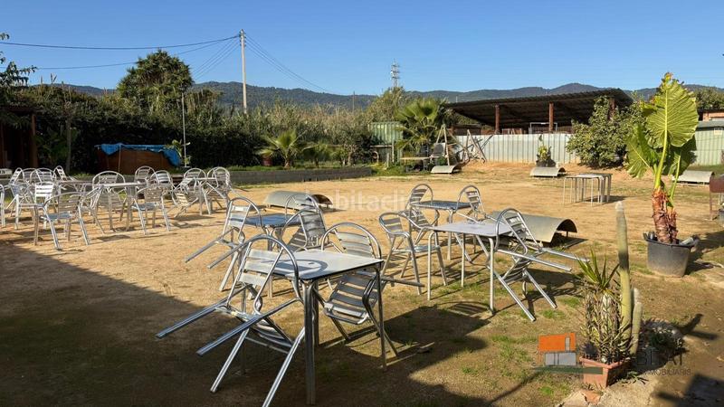 Foto 54ce8af0-3669-495a-bdc8-d96656c9c53d. Location local commercial dans Zona Industrial i Agrícola Vilassar de Mar